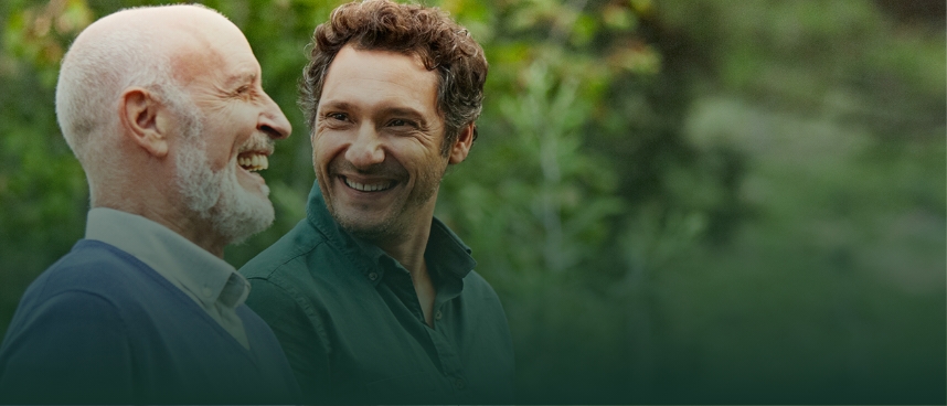 Two men smilling